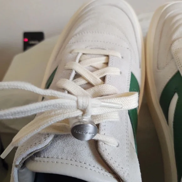 Fear of God Cream and Black Sneakers
